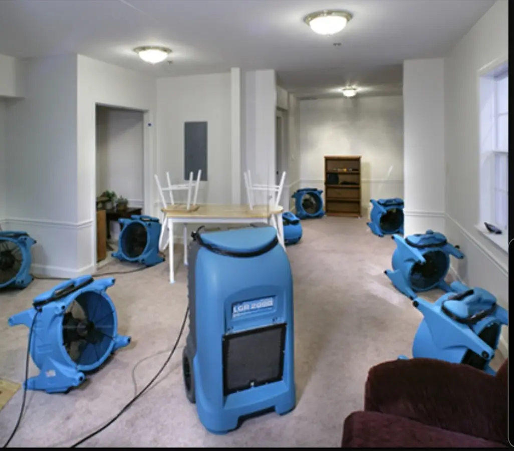 Air movers and dehumidifier setup for Water Damage Restoration in Uhrichsville